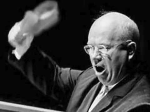 Nikita Khrushchev shakes his shoe while speaking at the United Nations