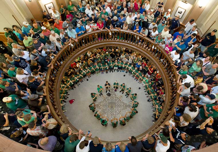 Aug. 30, 2013; Fans gather to watch trumpet players from the Notre Dame Band perform in the Main Building Rotunda on Friday before Notre Dame's game against Temple. Photo by Barbara Johnston/University of Notre Dame