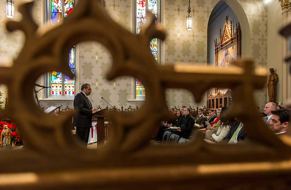 Dec. 11, 2013; Rev. Hugh Page, Vice President and Associate Provost for Undergraduate Affairs, speaks at the Community Leaders holiday prayer service in the Lady Chapel of the Basilica of the Sacred Heart.