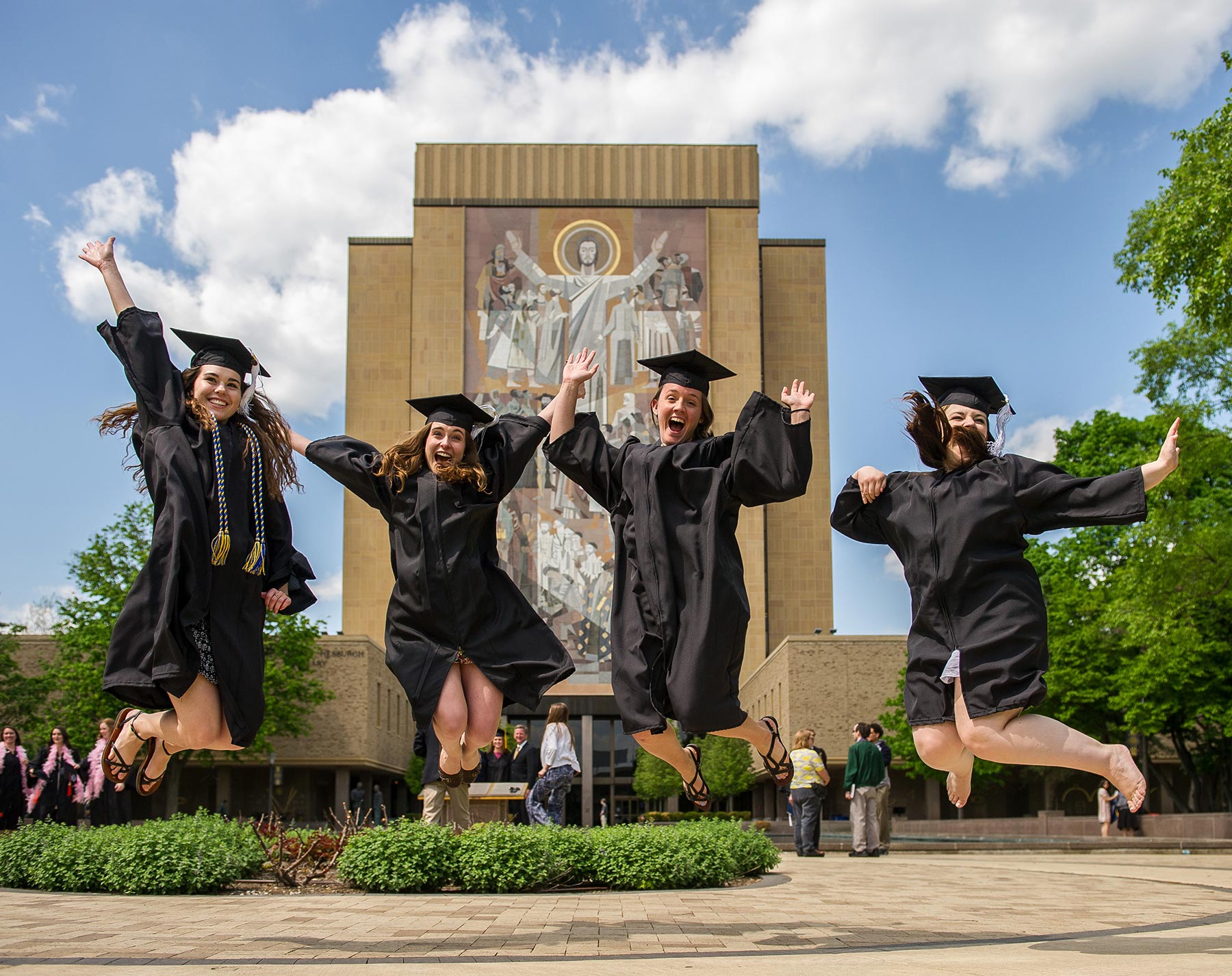 May 18, 2014; Graduates celebrate in front of Hesburgh Library after Commencement 2014. Photo by Matt Cashore/University of Notre Dame 
