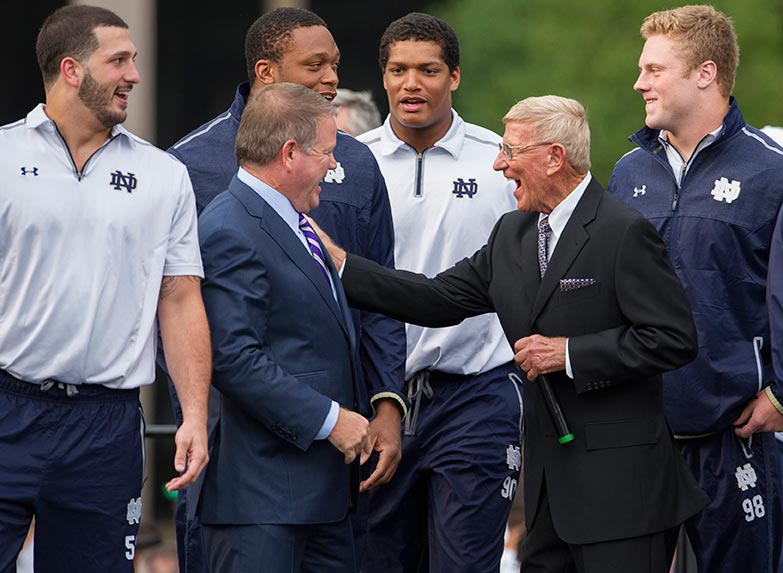 Wish Brian Kelly would share the joke with the rest of us because Lou Holtz sure seemed to like it!