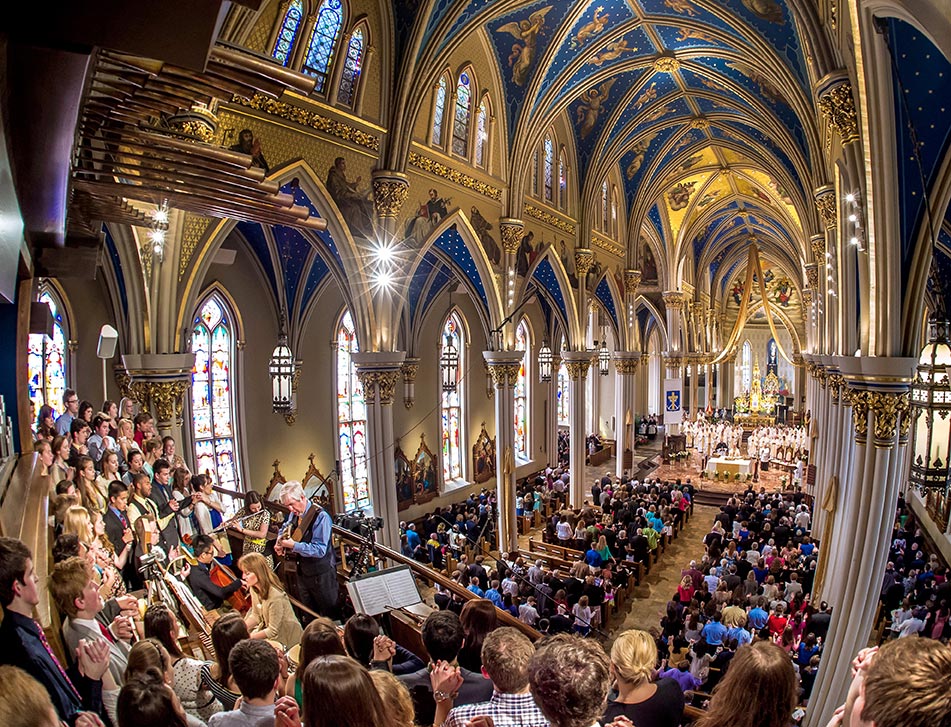 Apr. 26, 2014; Steven Warner and the Folk Choir sing the Our Father at the 2014 Ordination Mass in the Basilica of the Sacred Heart. Photo by Matt Cashore/University of Notre Dame