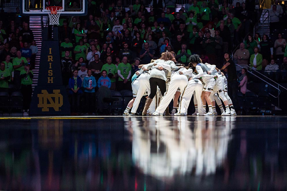 Dec. 21, 2014; The Women's Basketball team gather in a huddle before the game against the St. Joseph's Hawks at the Purcell Pavilion. (Photo by Matt Cashore/University of Notre Dame)