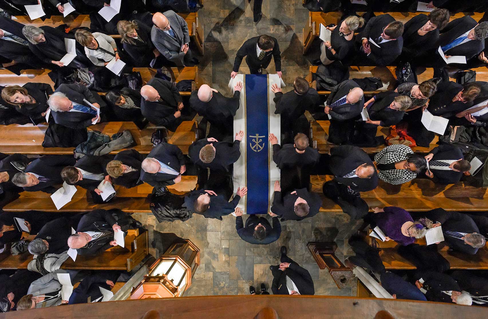 Mar. 4, 2015; The casket of President Emeritus Rev. Theodore M. Hesburgh, C.S.C. is moved toward the front of the Basilica of the Sacred Heart at the beginning of the funeral Mass. (Photo by Barbara Johnston/University of Notre Dame)