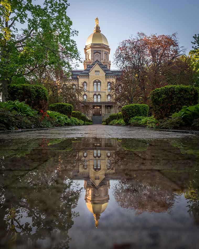 May 11, 2015; Reflection of the Main Building after a rain shower. (Photo by Matt Cashore/University of Notre Dame)