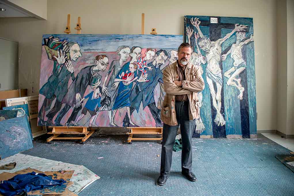May 5, 2015; Maxim Kantor, renowned Russian artist and Director's Fellow at the NDIAS paints in his studio at Notre Dame. (Photo by Barbara Johnston/University of Notre Dame)