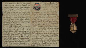 Letter, Thomas Francis McGrath to his mother, January 20, 1863 and Veteran’s Badge, Dedication of NY State Monument, Antietam, September 17, 1920.
