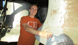 Student Drew Orland at the top of the UT-Austin Bell Tower