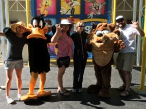 An obligatory picture with Looney Tunes characters. Here, my friends are signing "I love you" in ASL.